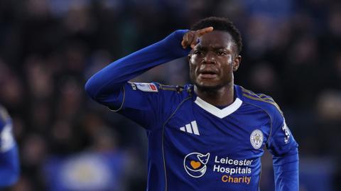 Abdul Fatawu celebrates scoring from inside his own half for Leicester