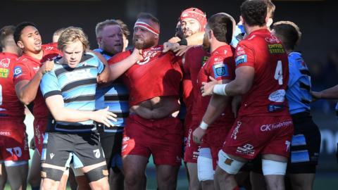 Players from Cardiff and Scarlets clash