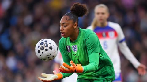 Khiara Keating catching the football on her England debut