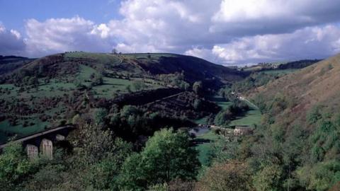 The Monsal (officially the Headstone) Viaduct crossing Monsal Dale in summer, as seen from Monsal Head.