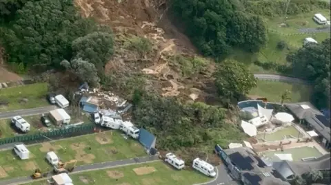  An aerial view of an area affected by a landslide triggered by heavy rains, in Mount Maunganui
