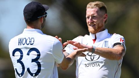 Ben Stokes celebrates a wicket with Mark Wood