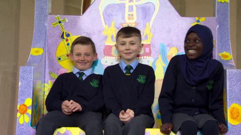 Kids sitting on bench