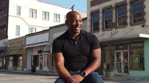 Brian Rice, pictured in front of some of his buildings