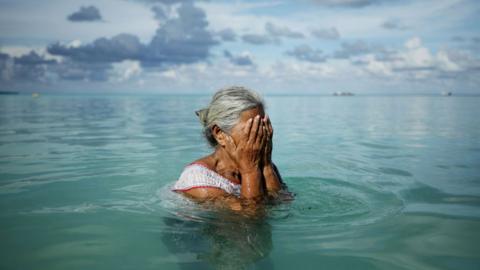 Woman in sea water