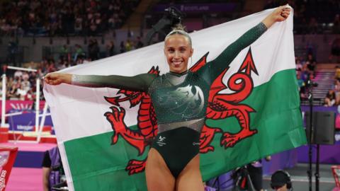 Abigail Roper with the Wales flag