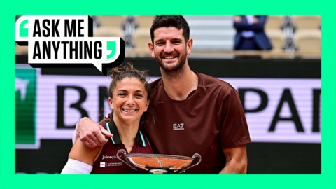 Italy's Sara Errani (left) and Italy's Andrea Vavassori pose with their trophy
