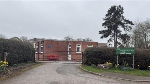 Dean Hole CofE Primary School a one-storey brick building