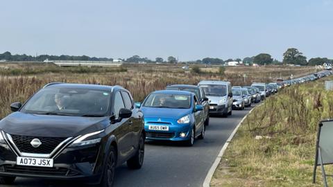 Queue of cars on a one way system.