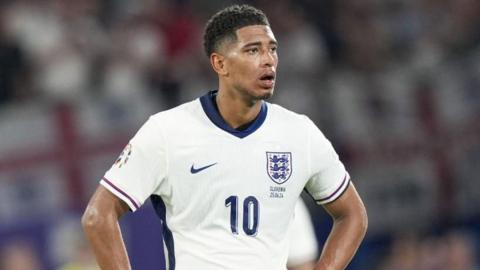 Jude Bellingham with his hands on his hips after England's goalless draw with Slovenia