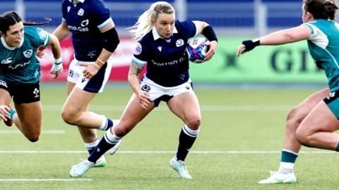 Scotland rugby player Chloe Rollie in action
