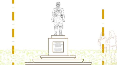 An architectural line drawing of the proposed Sikh War Memorial. The illustration features a statue of a Sikh soldier in historical British Indian Army uniform, including a turban and sword, standing atop a tiered stone plinth. The central pedestal contains a commemorative inscription. Two outlined figures of people walking are shown to the right.