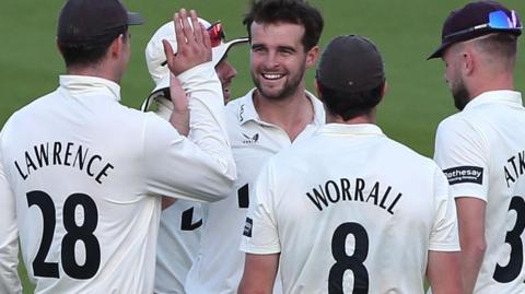 Surrey celebrate wicket