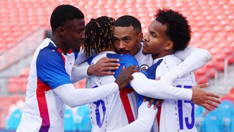 Wilson Isidor of Haiti celebrates with teammates after scoring a goal during an International Friendly against Iceland