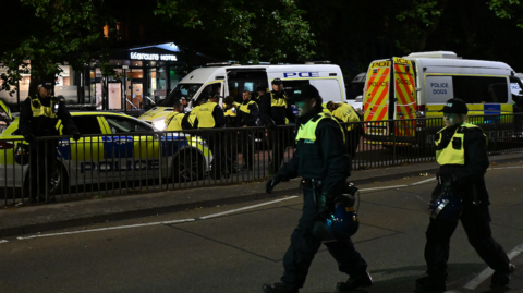 Police attending to the unrest in Bristol on 3 August.