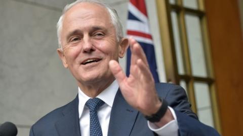 Malcolm Turnbull gestures at reporters in Canberra (23 Aug 2018)