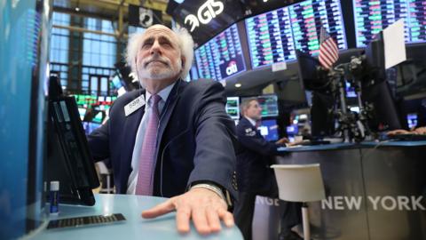 Traders work on the floor of the New York Stock Exchange (NYSE) on February 6, 2018 in New York City.