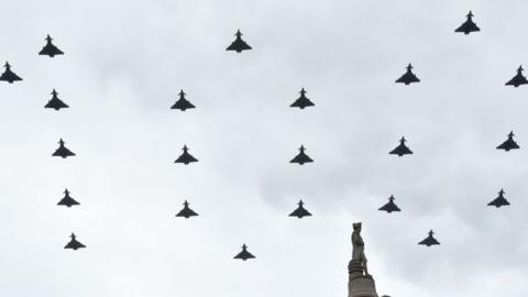 Typhoons spell out "100" as they fly over Trafalgar Square