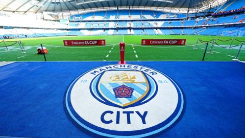 A general view of the Manchester City club crest in the stadium ahead of the Emirates FA Cup Third Round match at the Etihad Stadium, Manchester