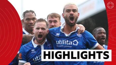 Eastleigh's Paul McCallum celebrates his winning goal against Reading with his team-mates