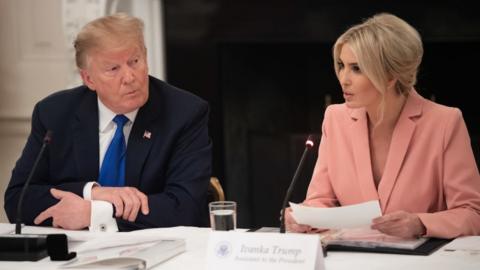 President Trump sits next to his daughter and adviser Ivanka