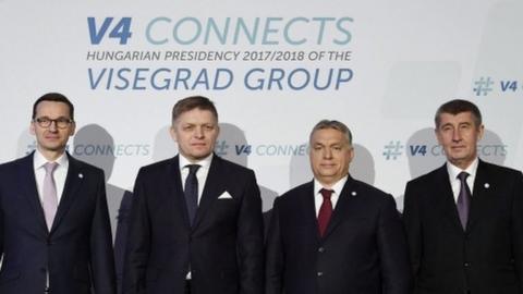 Visegrad group leaders pose standing for press photographs