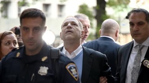 Harvey Weinstein arrives for arraignment at Manhattan Criminal Courthouse in handcuffs after being arrested and processed on charges of rape, committing a criminal sex act, sexual abuse and sexual misconduct on May 25, 2018