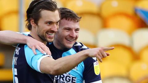 Cambridge United celebrate their first goal against Mansfield Town