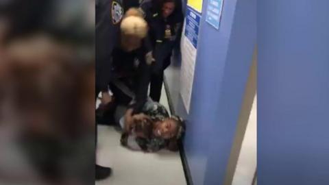 The police department is investigating an incident in which officers grabbed a baby from his mother during an arrest in Brooklyn.