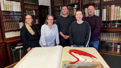 Guille-Allès Library staff with books