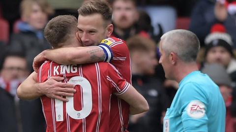 Andreas Weimann (centre) opened the scoring for Bristol City in their victory over Blackpool at Ashton Gate Stadium