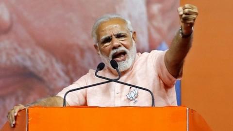 India"s Prime Minister Narendra Modi addresses an election campaign rally ahead of the Karnataka state assembly elections in Bengaluru, India, May 8, 2018