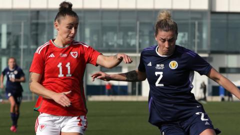 Hannah Cain of Wales takes on Nicola Docherty of Scotland