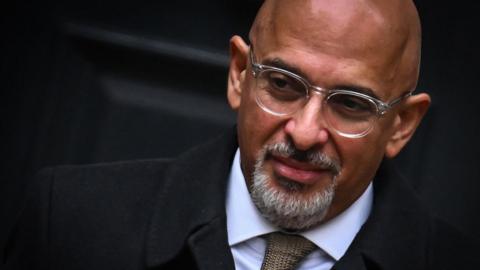 Britain's Minister without Portfolio and Conservative party chairperson Nadhim Zahawi leaves the party head office in London, on January 24, 2023.
