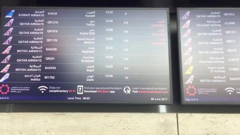 Departures board at Doha airport - 6 June 2017