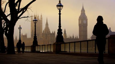 Big Ben and the Houses Of Parliament seen on a foggy morning from the other side of the river