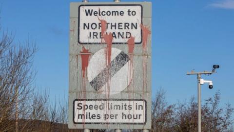 Signage welcoming motorists from the Irish Republic into Northern Ireland is pictured on the main Dublin/Belfast motorway near Newry on January 1, 2021