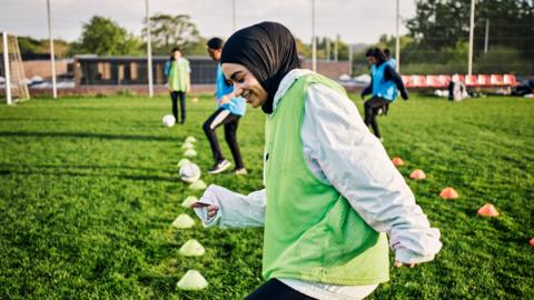 girls-doing-football training.