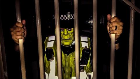 Police officer dressed as Frankenstein's monter