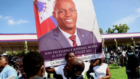 Mourners attend the funeral of slain Haitian President Jovenel Moïse on July 23, 2021, in Cap-Haitien, Haiti, the main city in his native northern region.