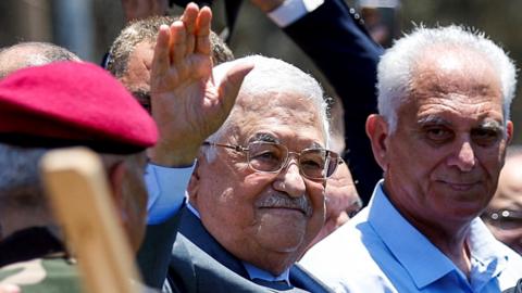 Palestinian President Mahmoud Abbas waves during a visit to Jenin, in the occupied West Bank (12 July 2023)