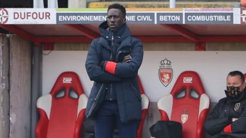 Standard Liege's Senegalese coach Mbaye Leye