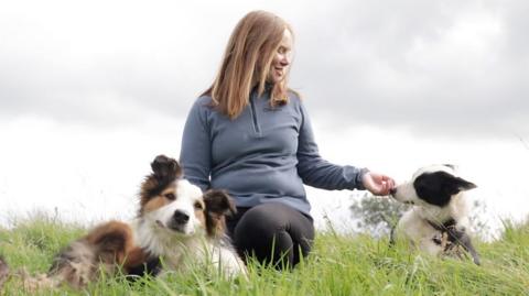 Helen Rebanks, the farmer's wife, with two of her sheepdogs