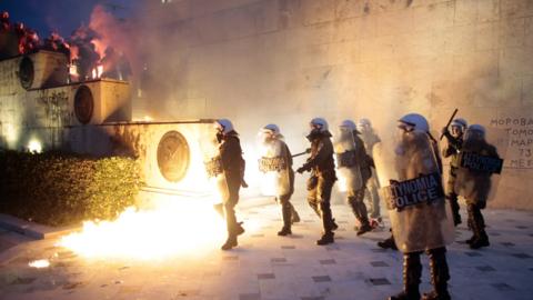 Greek police clash with protesters in front of parliament on May 18, 2017 in Athens