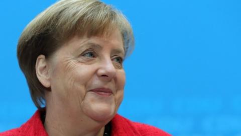 German Chancellor Angela Merkel speaks at a press conference at the Christian Democratic Union (CDU) headquarters in Berlin, Germany, 5 March 2018