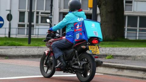A Deliveroo rider