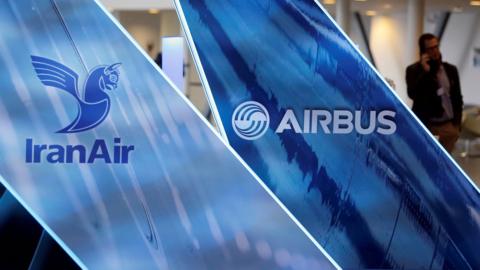 The logos of Airbus group and IranAir are pictured as IranAir takes delivery of first new Western jet, an Airbus A321, under an international sanctions deal in Colomiers, France, January 11, 2017