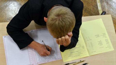 Boy sitting an exam