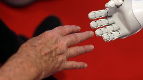 human hand and robot hand