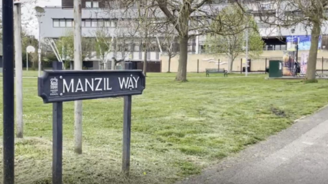 Manzil Way sign